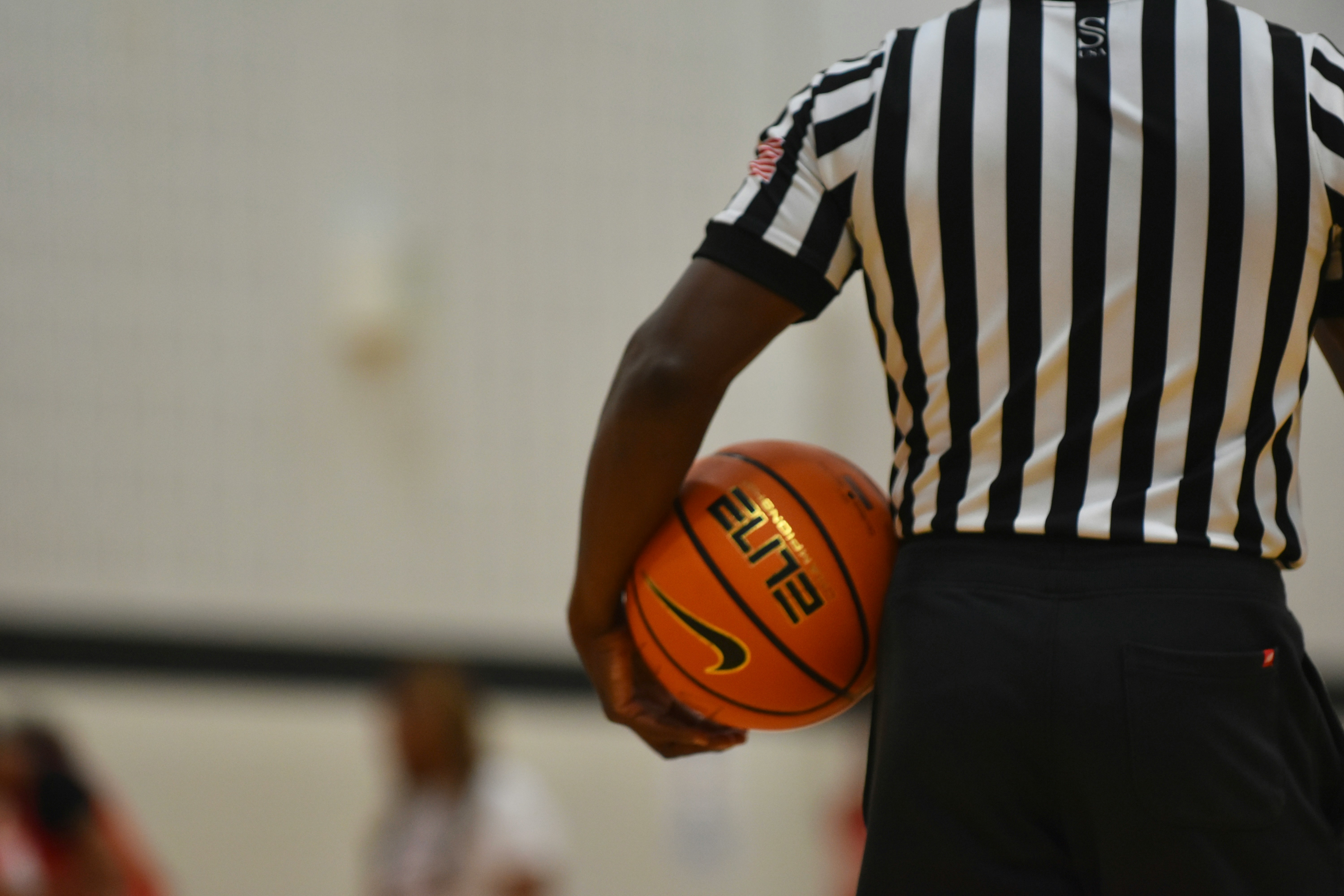 Referee in a basketball game.